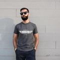 Man wearing a dark gray t-shirt with 