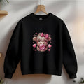 Black sweatshirt with a highland cow graphic wearing a pink bow and blowing bubblegum, surrounded by pink hearts.